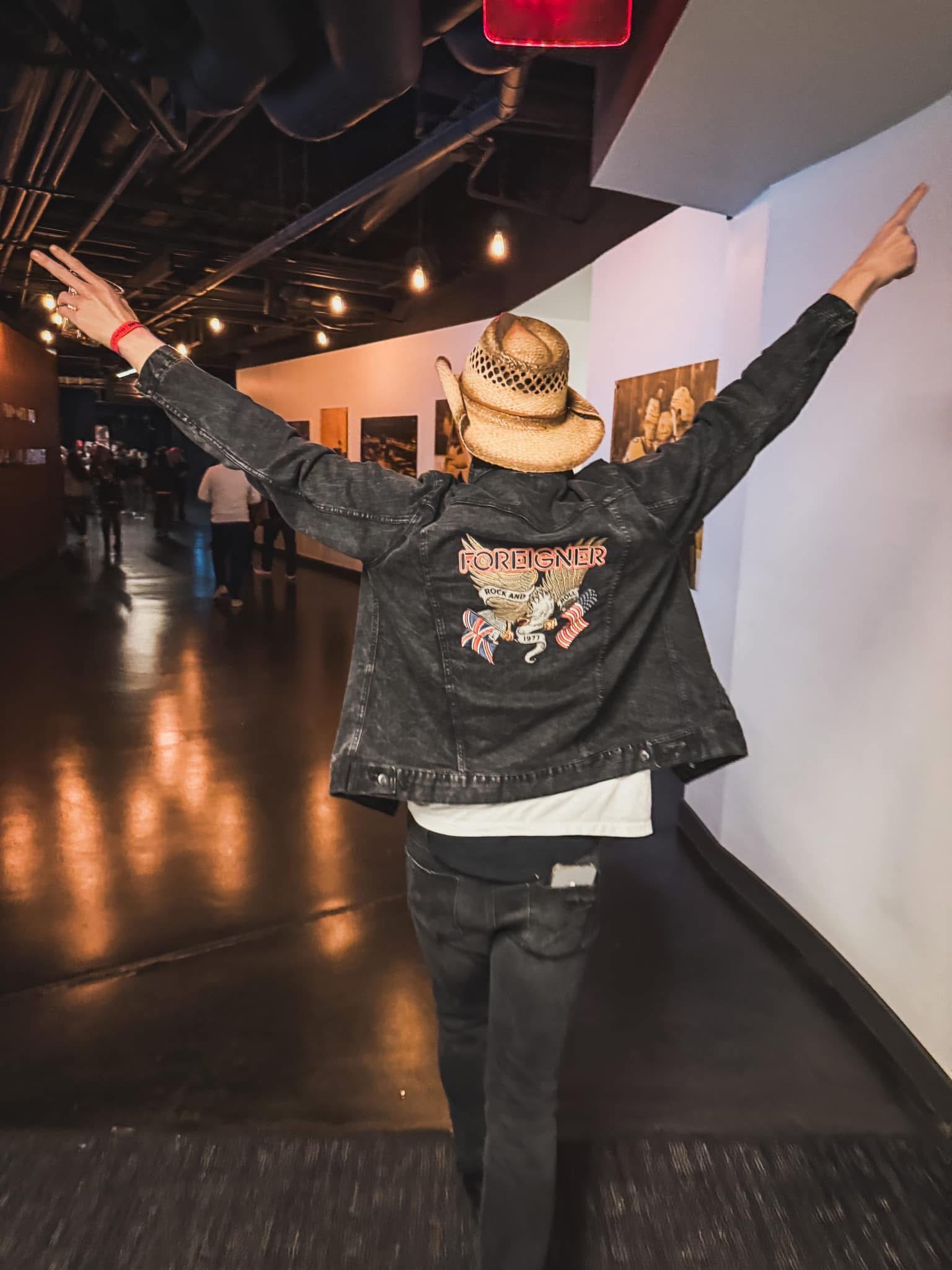 Geordie Brown wears a cowboy hat and a Foreigner Jean jacket in Nashville.